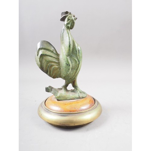 182 - A bronze model of a hen and chicks, on a green marble base, 5