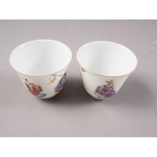 116 - A pair of Chinese porcelain wine cups each decorated four figures, seal mark to base, 2