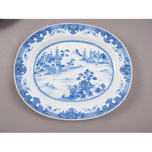 137 - A pair of Chinese oval shaped platters with landscape decoration, 13 1/4