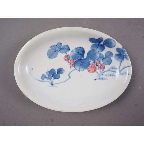 137 - A pair of Chinese oval shaped platters with landscape decoration, 13 1/4