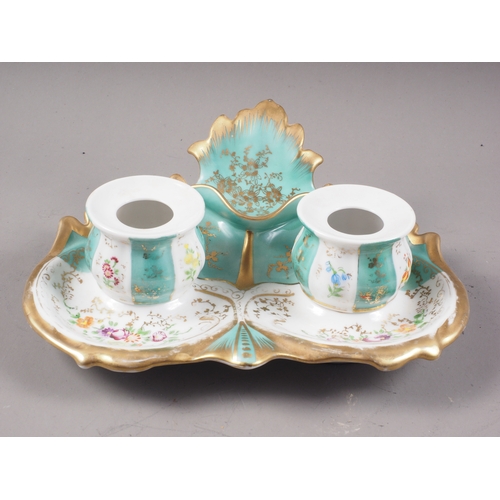 14 - A late 19th century French porcelain desk inkstand with two wells and floral and gilt decoration, 10... 