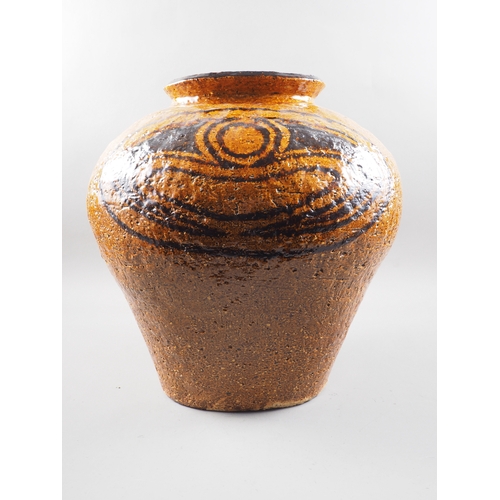 21 - A 1960s studio pottery stoneware vase with abstract decoration and honey glaze, 18