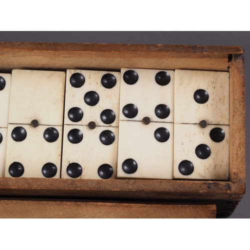 215 - Two sets of bone and ebony dominoes