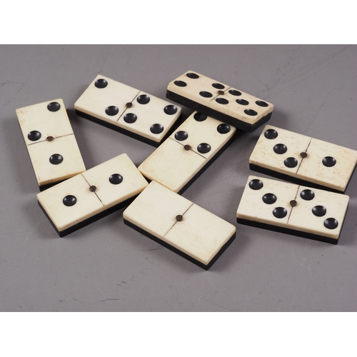 215 - Two sets of bone and ebony dominoes