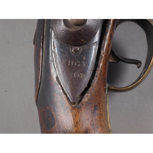 216 - An 18th century Naval flintlock pistol, 9