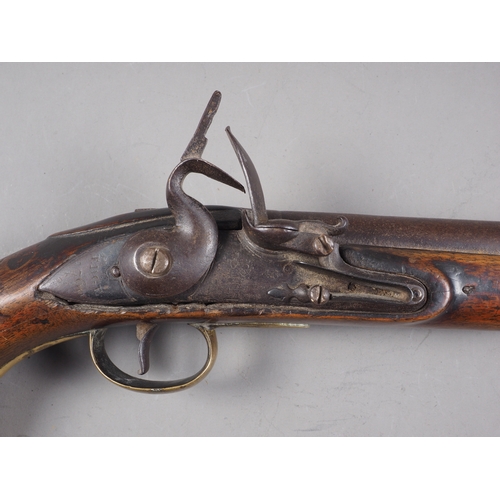 216 - An 18th century Naval flintlock pistol, 9