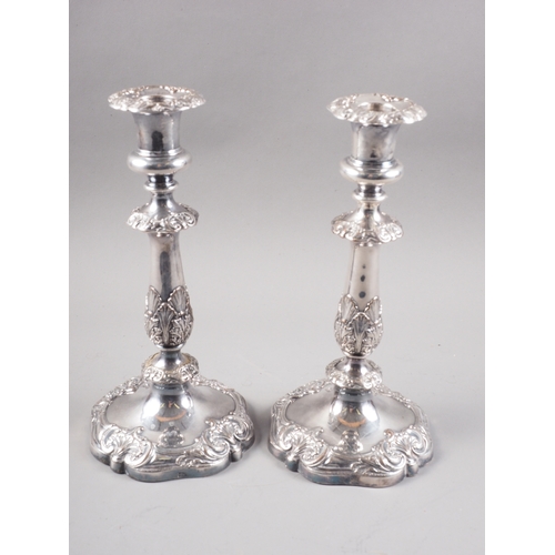 336 - A pair of silver plated candlesticks, 10