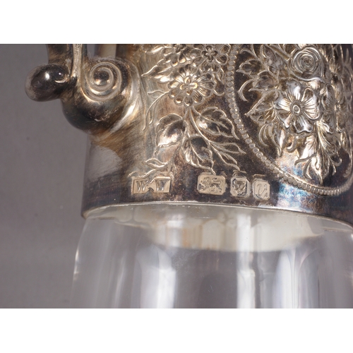 358 - A silver mounted claret jug with star cut base