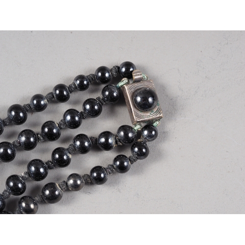 369 - A haematite bead necklace, an iridescent bead necklace and other jewellery