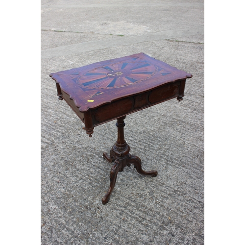 488 - A late 19th century carved walnut and parquetry shape top work table with part fitted interior, on t... 