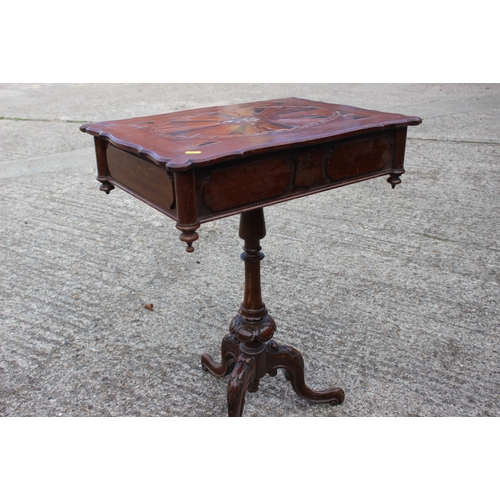 488 - A late 19th century carved walnut and parquetry shape top work table with part fitted interior, on t... 