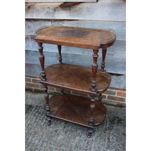 489 - A Victorian burr walnut three-tier whatnot with brass gallery top, 26