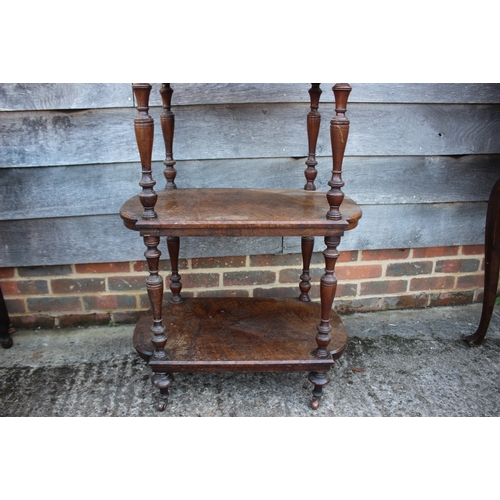 489 - A Victorian burr walnut three-tier whatnot with brass gallery top, 26