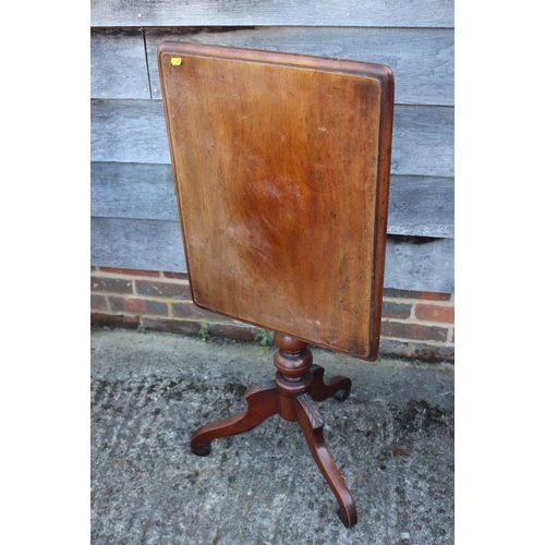 496 - A 19th century walnut rectangular tilt top occasional table, on tripod splay supports, 24