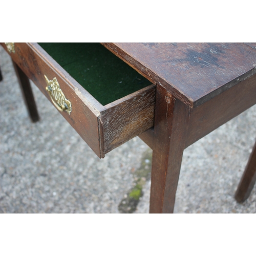 502 - A Georgian provincial side table, fitted one drawer, on champhered supports, 36