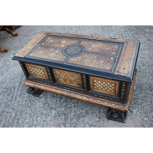 503 - An antique Anglo Indian bone and brass inlaid chest with triple panel front carved tortoise supports... 