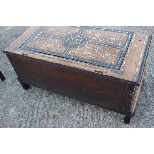 503 - An antique Anglo Indian bone and brass inlaid chest with triple panel front carved tortoise supports... 