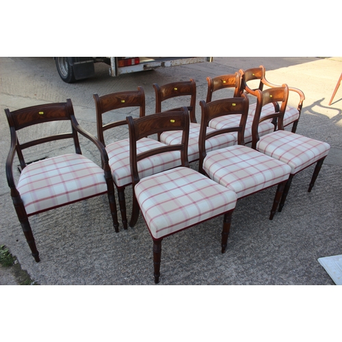 504 - A set of eight early 19th century mahogany bar back dining chairs with stuffed over seats, upholster... 