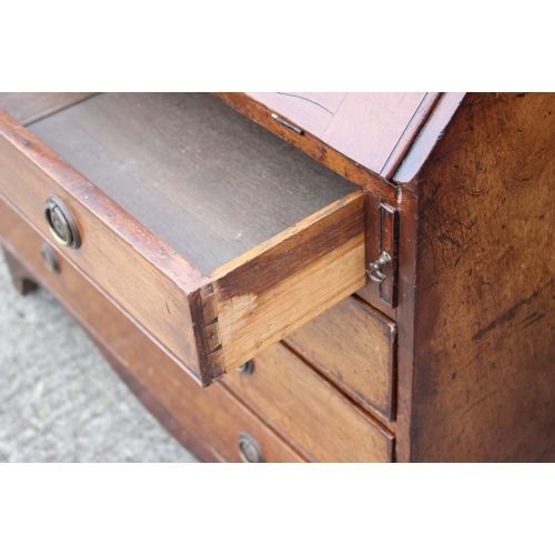 511 - A Georgian mahogany fall front bureau, the interior fitted pigeonholes and drawers over four long gr... 