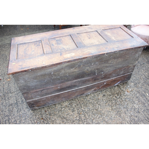 529 - An 18th century chip carved oak triple panel coffer, with candle box, 57