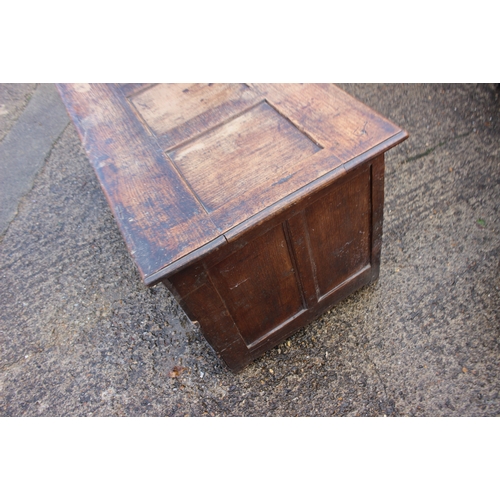 529 - An 18th century chip carved oak triple panel coffer, with candle box, 57