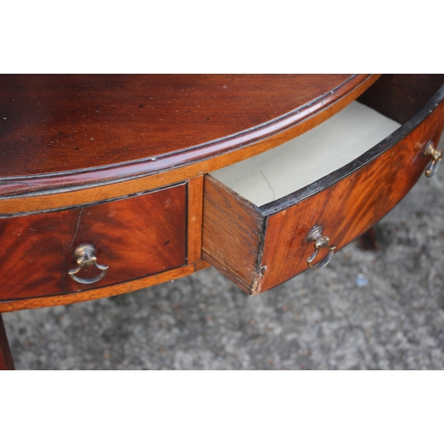 536 - A 19th century mahogany bowfront corner washstand, fitted two drawers, on splay supports, 24