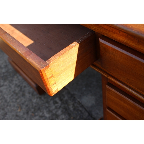 537 - A late 19th century mahogany double pedestal desk with tooled leather top over nine drawers, 52