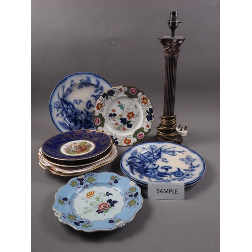 54 - A pair of Limoges plates with central figure decoration and blue and gilt borders, 9