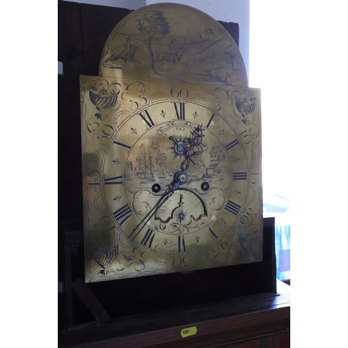 556 - A late 18th century provincial oak long case clock with arch top brass dial and eight-day striking m... 