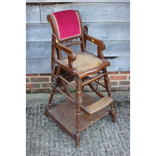 582 - A child's ash metamorphic high chair/table with back upholstered in a red velour