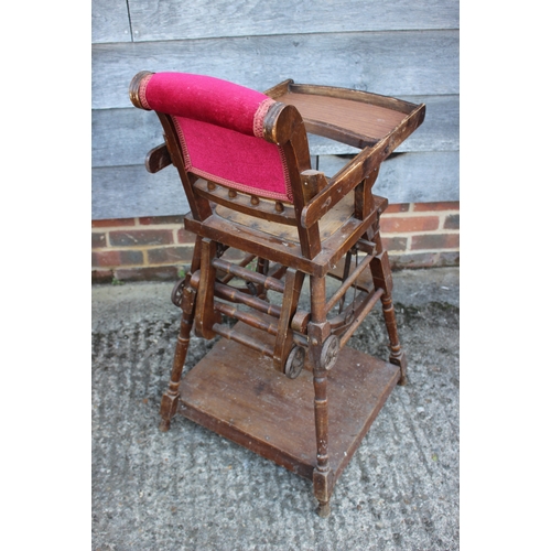 582 - A child's ash metamorphic high chair/table with back upholstered in a red velour