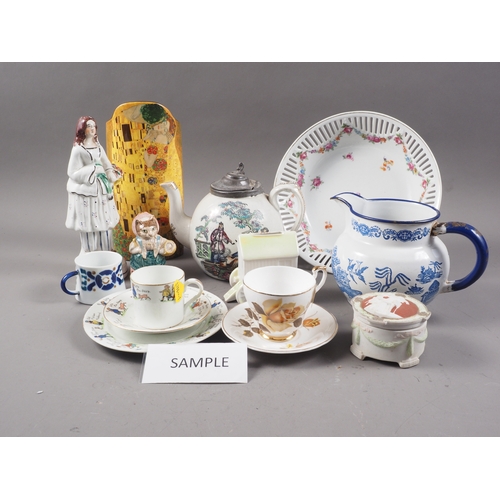 60 - Five 19th century Fairings, a Staffordshire figure, a nursery cup, saucer and plate, and other decor... 