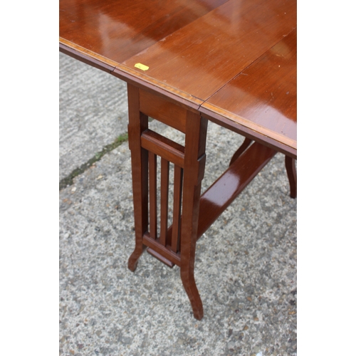 607 - An Edwardian mahogany and banded Sutherland tea table, 24