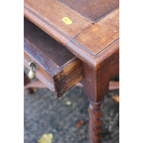 625 - An oak square top desk, fitted one drawer, on barley twist supports, united by an 'X' stretcher, 24