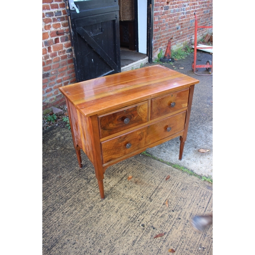 627 - A 1930s carved mahogany dressing chest of two short and two long drawers, on ogee bracket supports a... 