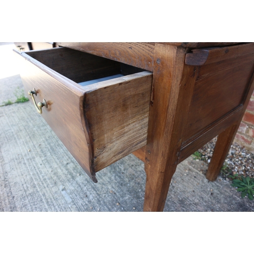 642 - An antique French oak dresser base, fitted three deep drawers, on champhered supports, 72