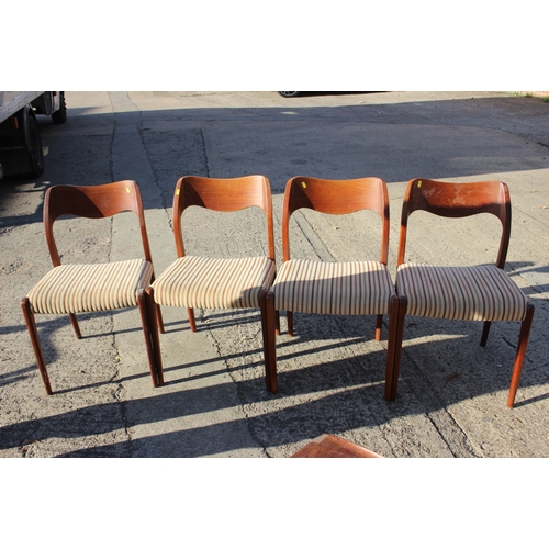 648 - A set of four mid century Danish teak dining chairs with stuffed over seats, on splay supports