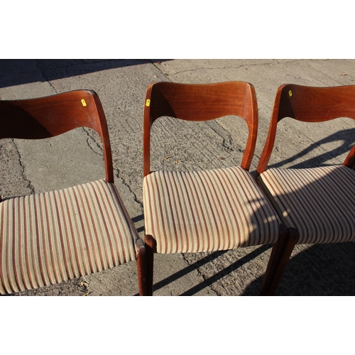 648 - A set of four mid century Danish teak dining chairs with stuffed over seats, on splay supports