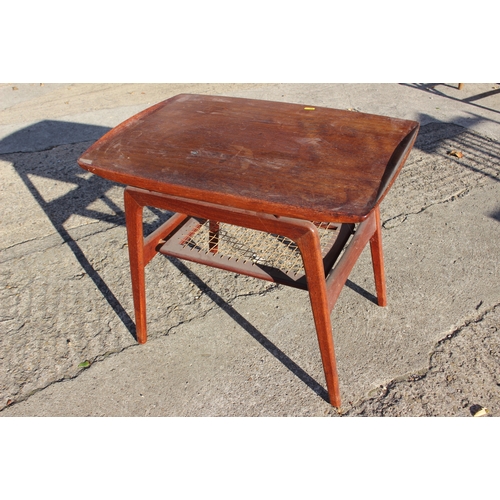 649 - A mid century Danish teak two-tier occasional table, with string undertier on splay supports, 25 1/2... 