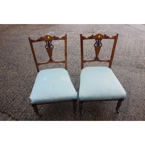 653 - An Edwardian rosewood, line inlaid and box strung salon suite, comprising two armchairs, a pair of s... 