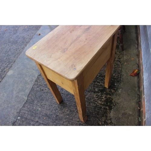 665 - A waxed pine side table, fitted one drawer on turned supports, 28 1/2