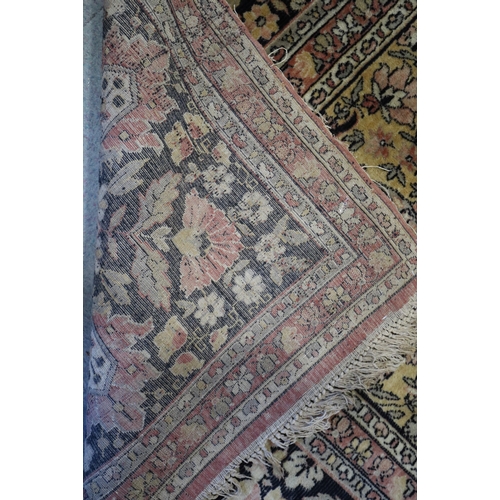 682 - A Persian Kerman city carpet with all-over foliate design and central medallion on a cream ground an... 