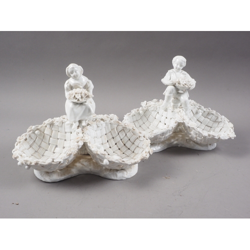 8 - A pair of late 18th century Meissen blanc-de-chine dishes, formed as baskets with child finials, 9