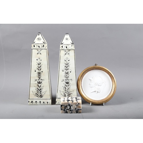 284 - A pair of bone obelisks, 12 1/4