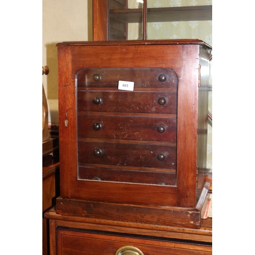 485 - A collector's polished as mahogany chest of six long graduated drawers with glazed panel door and bl... 