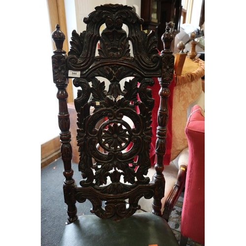 544 - A carved oak side chair of early 17th century design with pierced scrollbar back and stuffed over se... 