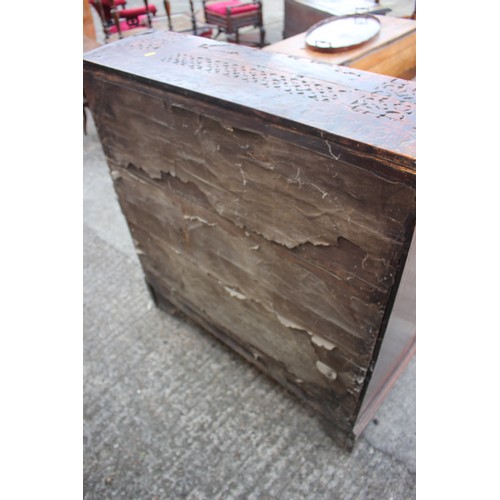 484 - A carved fall front bureau with fitted interior over three graduated drawers on bracket feet, 36