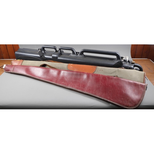 230 - A canvas and leather shotgun slip/case, 50