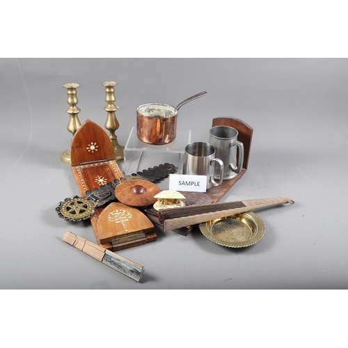 272 - Two wooden adjustable book slides, a copper sauce pan, picture frames and other items