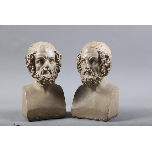 283 - A pair of cast stone bookends, formed as the head of Homer